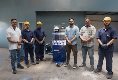 Team with oxygen booster pump trolley unit at facility